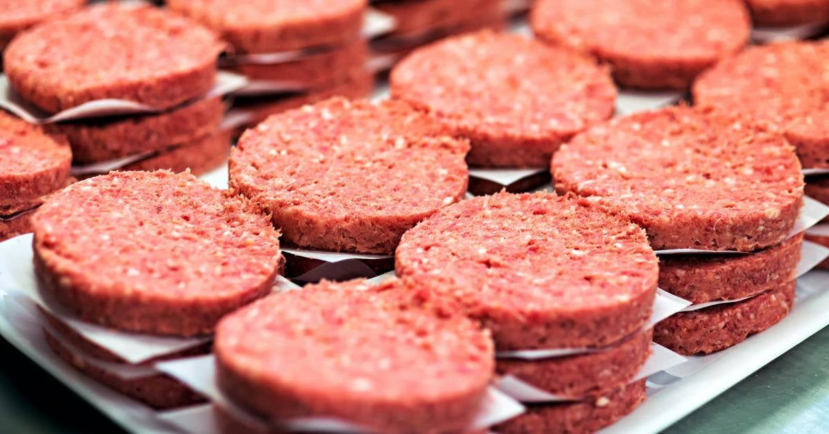 Meat Patties stacked with parchment