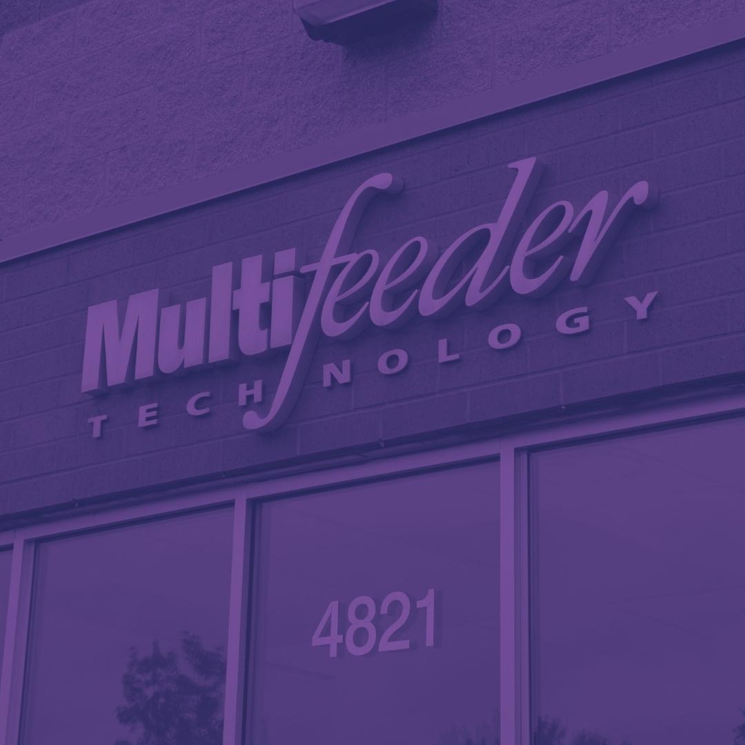 Outside the Multifeeder Technology building. Multifeeder Logo over the front door.